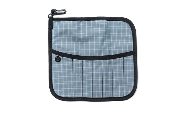 The front of a Tool Pen Wrap in Tidal (pale blue with white grid) 200 Halcyon.